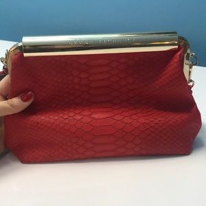 Red Armani exchange clutch with optional strap
